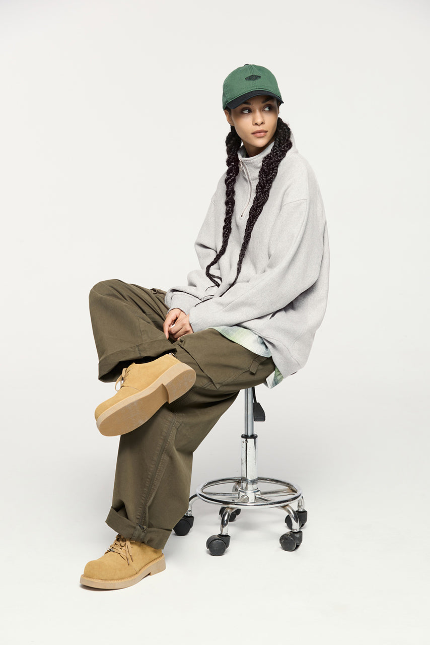 Sudadera con capucha y media cremallera