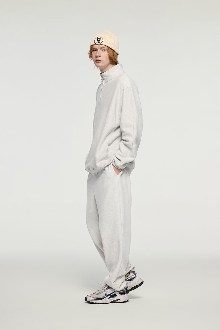 Sudadera con capucha y media cremallera