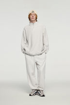 Sudadera con capucha y media cremallera