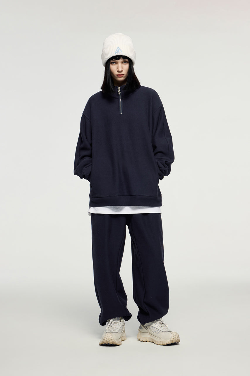 Sudadera con capucha y media cremallera