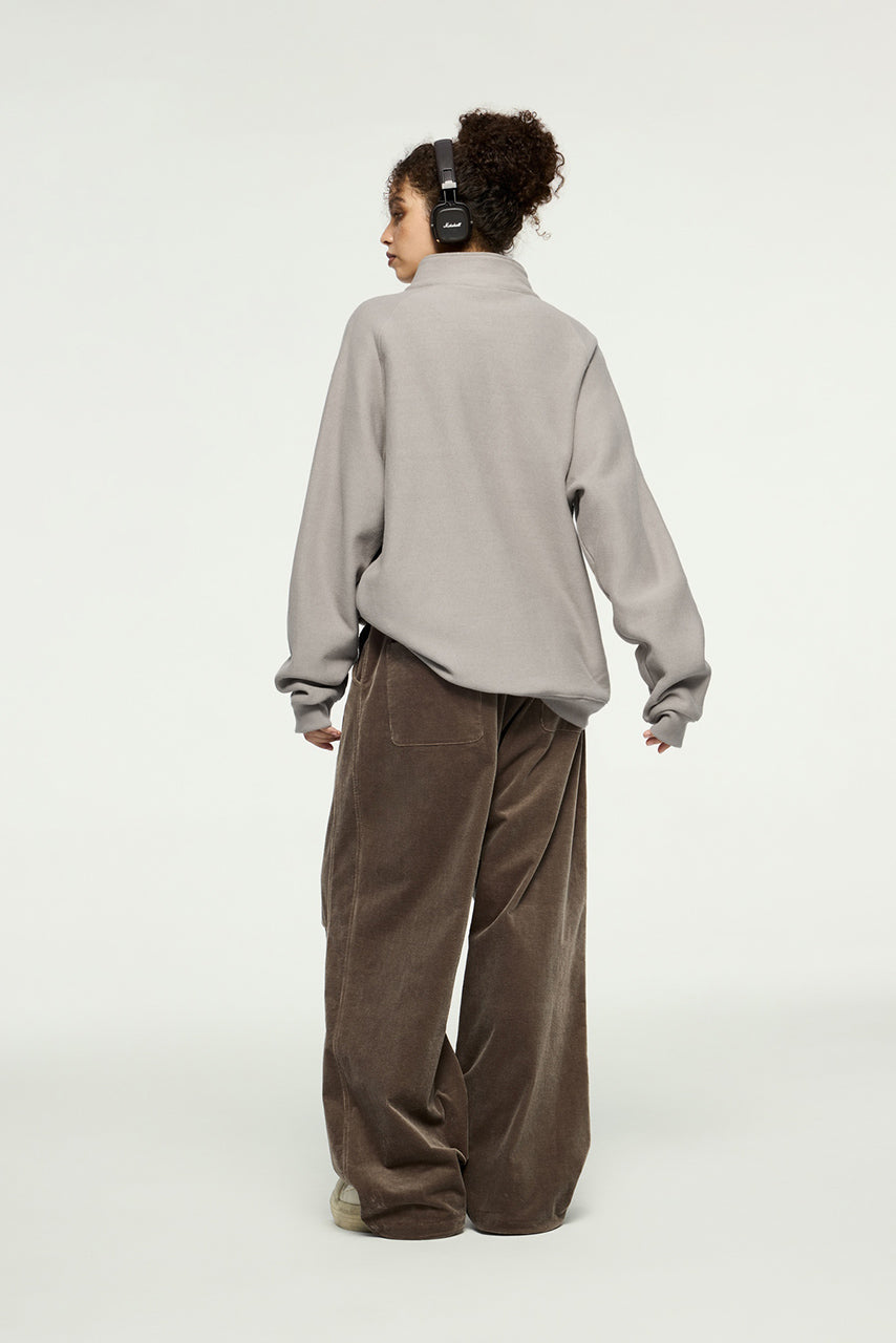 Sudadera con capucha y media cremallera