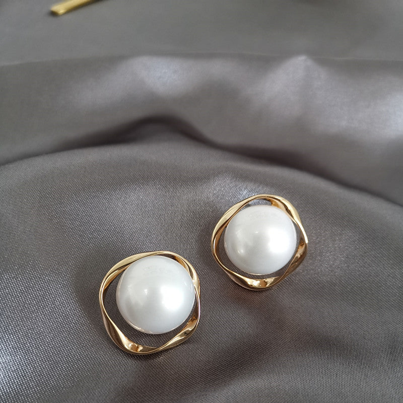 Luminous Ripple Pearl Stud Earrings